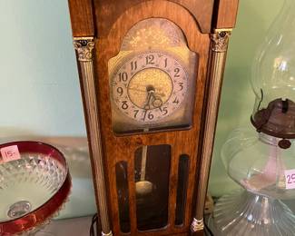 #238	miniature grandfather clock	 $25.00 

