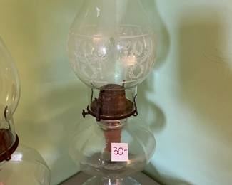 #239	oil lamp 19 inches tall, etched top	 $30.00 

