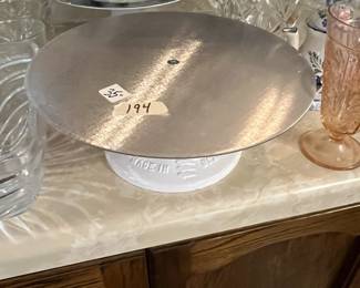 #194	Cast Iron Base Rotating Working Cake Stand 	 $35.00 
