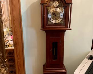 #30	Grandmother clock with key 70x10x15	 $175.00 
