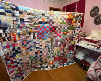 #204	Quilt completely scrappy machine quilted 70x80	 $60.00 
