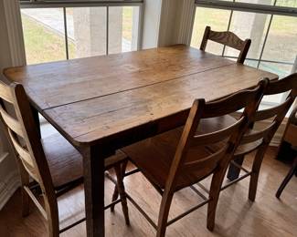 Wooden dining table and chairs