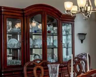 China hutch- dining table with leaf and 8 chairs.