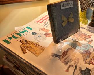 Stack of old Saturday Evening Post magazines