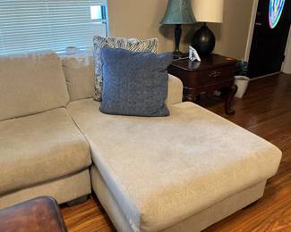 #34 - $400 	Sectional sofa 61Lx38Dx28H corner piece 28x28
	Center 75L (3 cushions) - lounger 55L
	Foam construction
