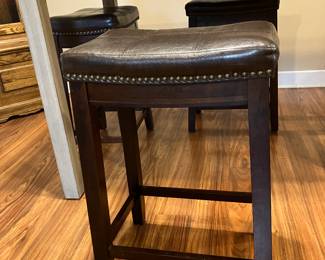 #22 - $300 	Tall grey table & 4 stools 

