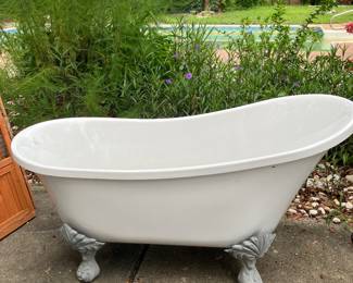 #67 - $400 	Plastic claw foot rub amd iron base  60W X 27D X 25H
