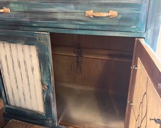 #50 - $150 	Blue white painted cabinet / mirror back 
