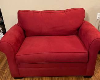 #26 - $240 	Cindy Crawford Home microsuede Red twin sleeper chair/ twin bed 52Wx36Dx32H
