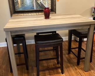 #22 - $300 	Tall grey table & 4 stools 
