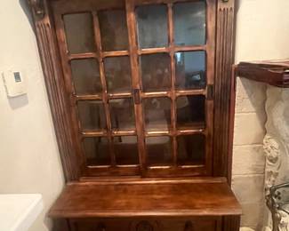 Beautiful solid wood lighted cabinet. Two available, one has sliding doors on the bottom, the other has drawers.
