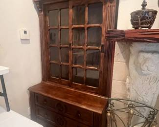 Beautiful solid wood lighted cabinet. Two available, one has sliding doors on the bottom, the other has drawers.