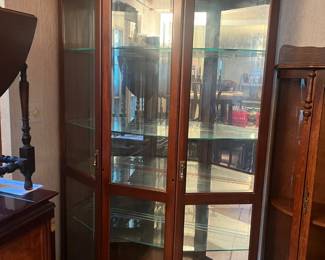 Large lighted glass curio cabinet