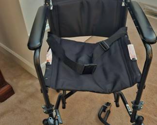 Push wheelchair, literally brand new - $120.00