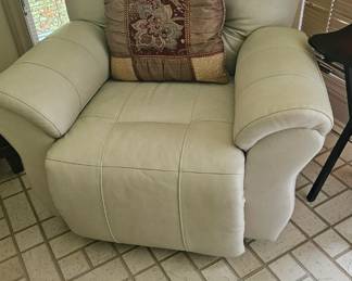 Beige leatherette recliner - great condition. 42" x 39" $295.00