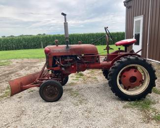 1954 McCormick Farmall Cub 10hp Tractor, w/manuals, single point plow, 6’ snow blade, 6’ sickle mower, 2 extra blades, 42” belly mower, and there are no chains that go on the tractor. Tractor has been upgraded to 12v system and alternator and electronic ignition - works great!
