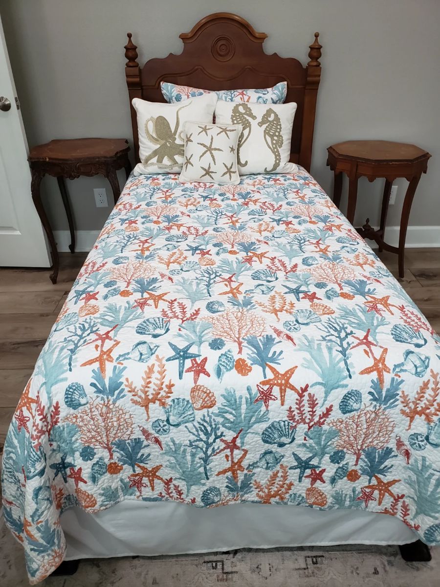 ANTIQUE STYLE TWIN BED WITH TRUNDLE AND POTTERY BARN SPREAD AND PILLOWS