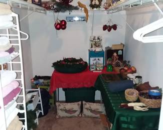 Closet with towels, Christmas decorations