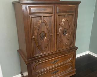 Small armoire that matches triple dresser and king headboard.