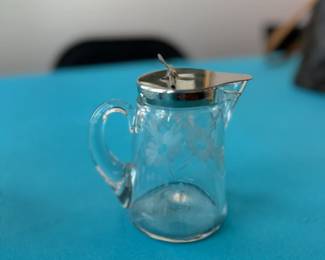 Vintage circa 1910's syrup pitcher.