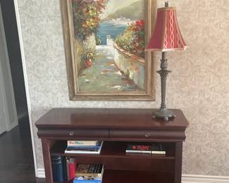 Entry cabinet, pretty buffet lamp and framed artwork.