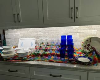 Vintage Corning Ware and cobalt blue drinking glasses.