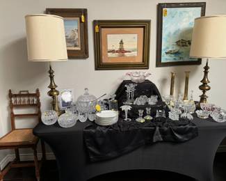Beautiful lidded crystal cider/ punch bowl with ladle and 16 cups. Also, many beautiful crystal candle holders.