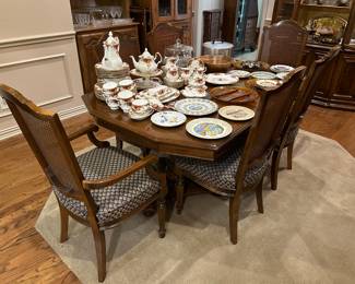 Ethan Allen formal dining table with 6 chairs and 2 leaves with matching china hutch