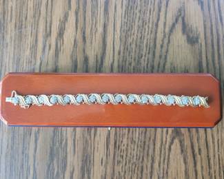 18k gold heavy bracelet with diamonds. Original owner paid 12k for this in the 1960s. This will be available by appointment only.