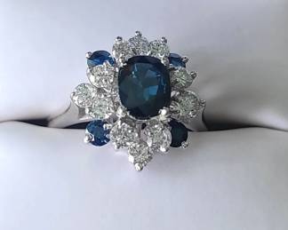 gold, diamond and sapphire ring available by appointment only.
