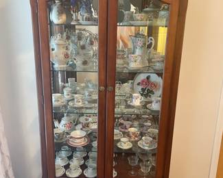 Sooo many collectible tea sets 