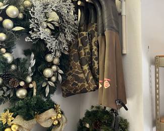 fishing waders and Christmas wreathes