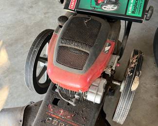 high-wheeled lawn trimmer