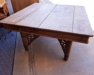 Antique oak table with unique carved base