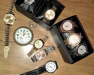 Nice selection of antique and modern watches. Victorian 1800's Moon phase pocket watch. Repop Rolex