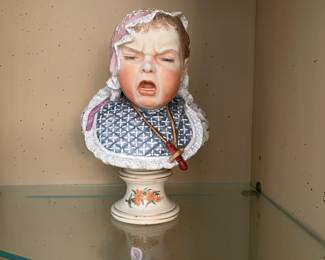 Bisque Handpainted Sad Baby on Stand 