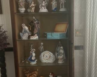 Cabinet with Lladro's, Boehm, Meisen, etc 