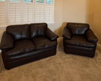 Black love seat and oversize chair