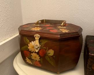 Antique painted boxes, bags and baskets.