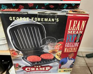 George Foremans "The Champ" Grilling Machine