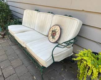 Green Wrought Iron Outdoor Couch with White Cushions