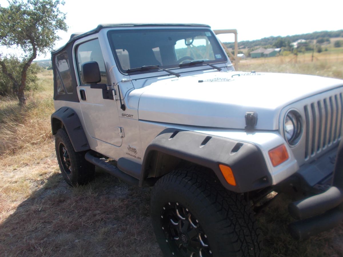 2003 Jeep Sport 6cyl. 92K miles Cleen and well maintained more photos below