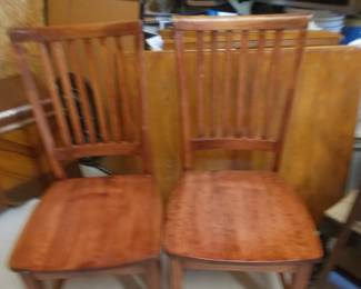 2 of 4 wooden chairs