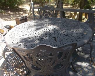 FABULOUS cast aluminum patio table and 4 chairs