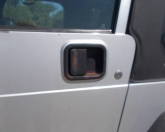 Slight rust on driver door latch