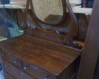 Antique 4 drawer dresser and beveled mirror
