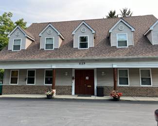 stand alone office building with parking spaces