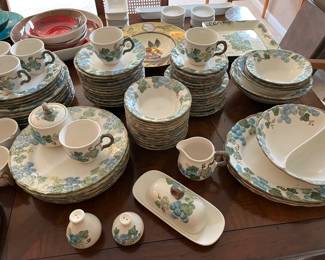 Large set of Metlox Sculptured Grape Poppytrail dinnerware.