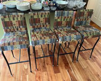 Four matching stools by MTS Seating.