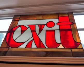 Stained glass “EXIT” sign.